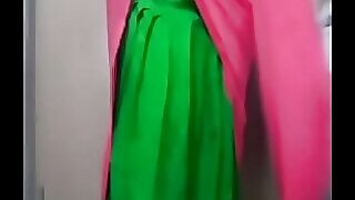 A busty Tamil mom indulges in explicit sexual acts with her younger lover, showcasing her skills in satisfying her partner.